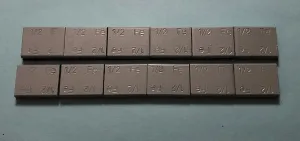 #13004 - 12 ea Steel 1/2 oz pieces (5/8x7/8x3/16")
